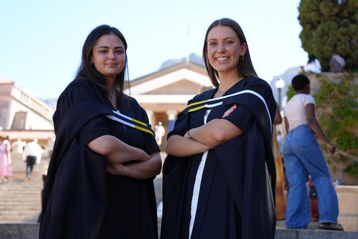 Team members Kelly O’Sullivan (left) and Cindy McKenzie. Regrettably, Charnè Verster was unable to attend graduation. Photo Carbon Visuals.