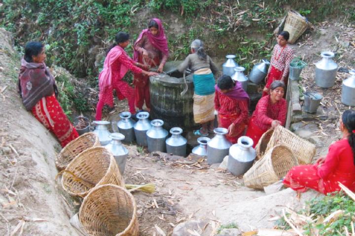 Rural setting in Nepal, women collecting water from stream. Picture: G.C. Apar, 2010