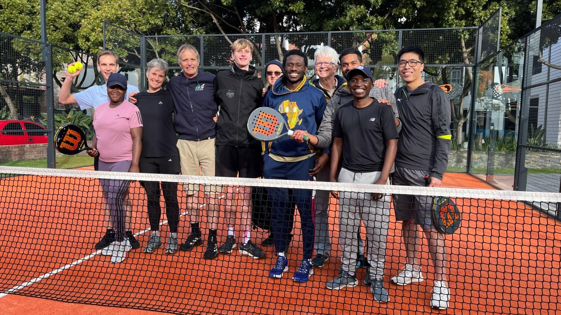 PRISM members, and family play padel