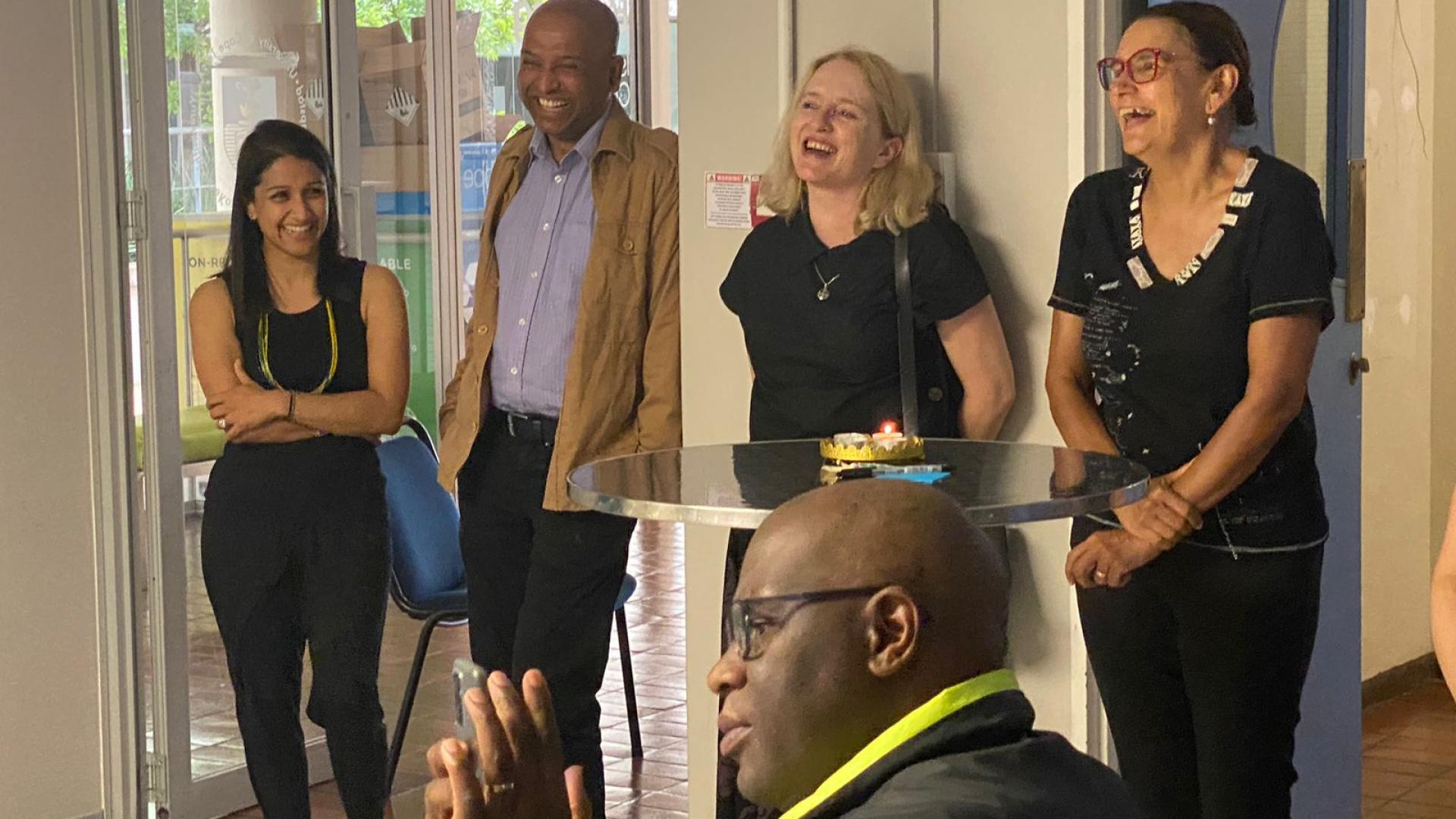Colleagues and friends laughing at the Imbizo Yethu launch