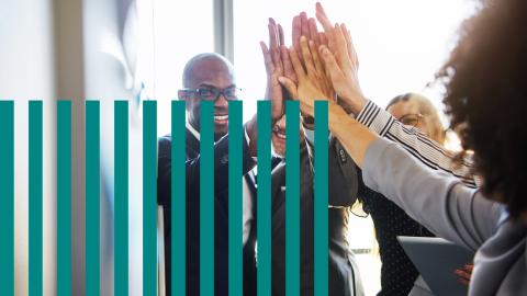 Team of people high-fiving