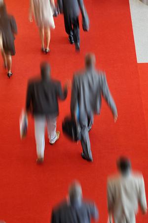 Moving people in a international conference venue. motion blur