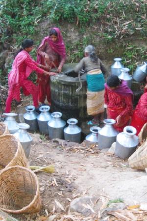 Rural setting in Nepal, women collecting water from stream. Picture: G.C. Apar, 2010