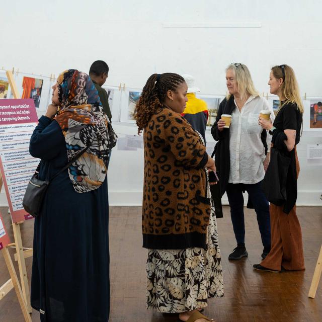 Visitors move through the exhibition, reflecting on the mothers’ Calls to Action.
