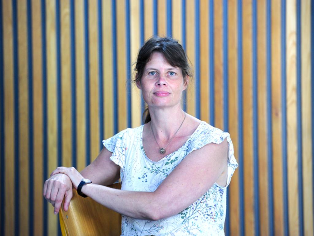 Portrait photograph of Prof Ines Meyer sitting on a chair