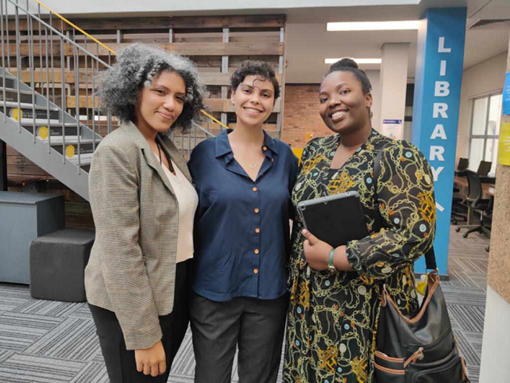 Team Finclusive at the Map the System regional final, held at the UCT GSB Solution Space on 4 May 2022. From left: Lauren Fray, Janine Rutsch and Makha Baloyi.
