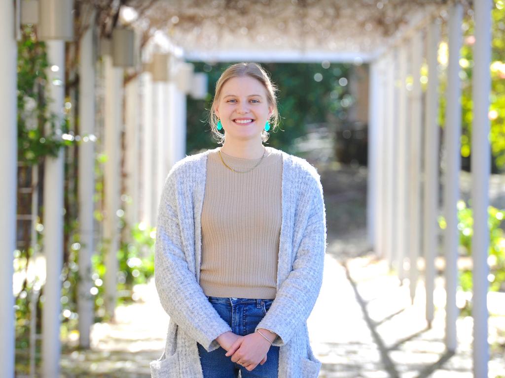 Emma Whitelaw graduates with her PhD in economics from UCT on 21 July.