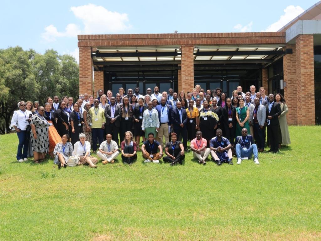 Group photo of the attendees at the Close-Out Celebration
