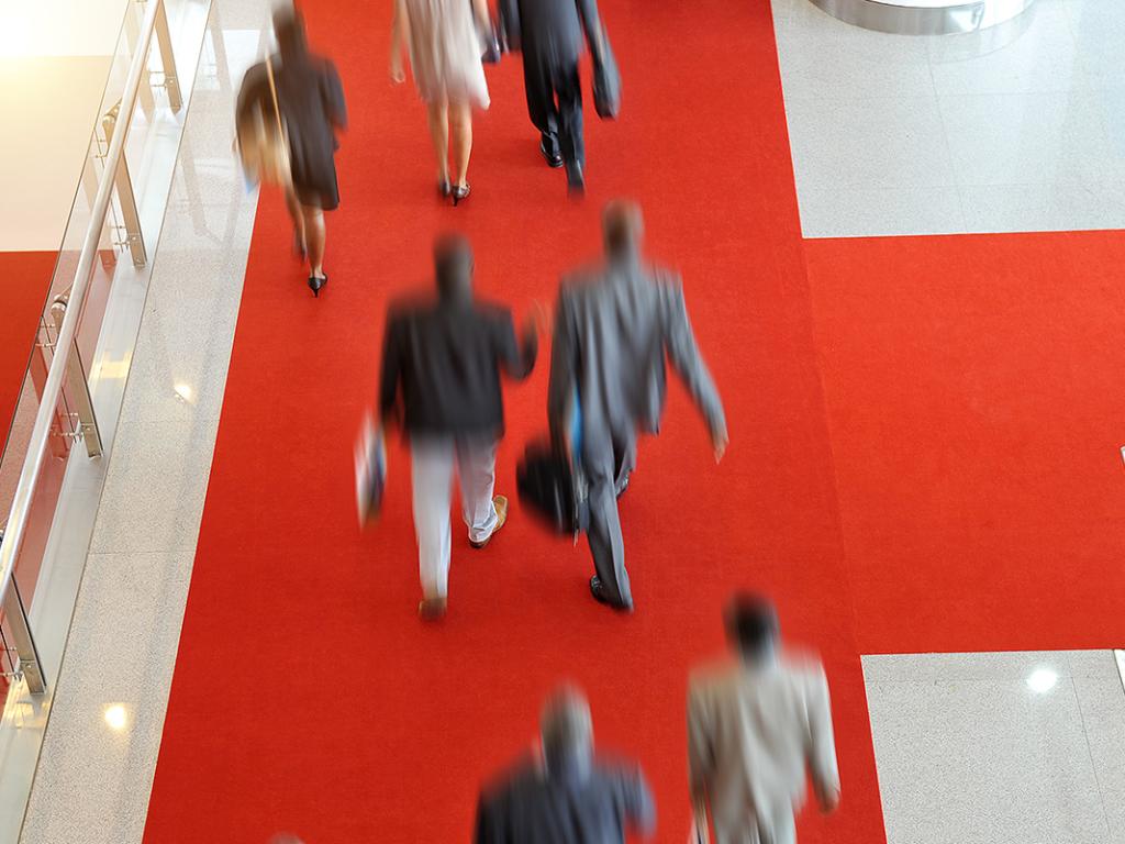 Moving people in a international conference venue. motion blur