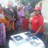Researchers explain the functions of lilquid petroleum gas stoves to participants in experiment