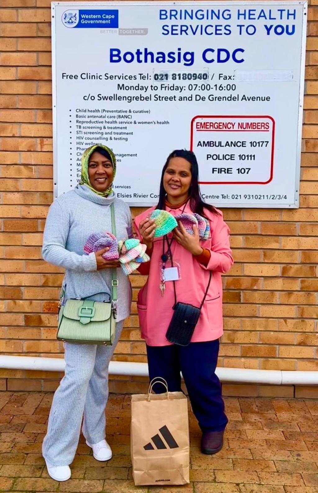 DPRU handover of baby beanies